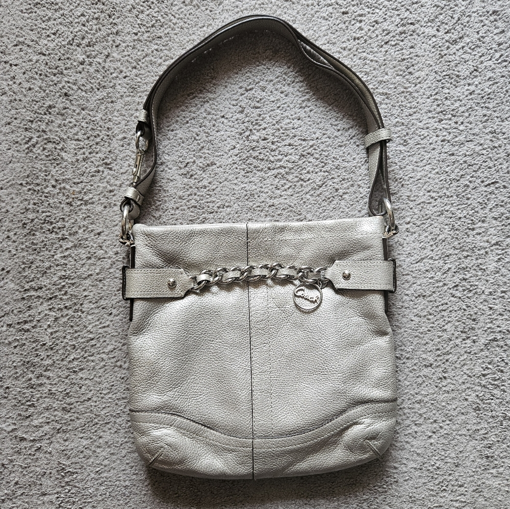 Mettalic silver Coach chain duffle shoulder bag.